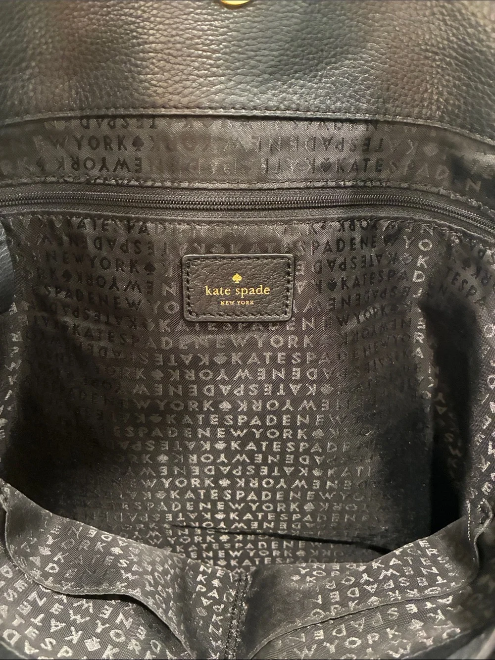 kate spade Black Pebbled Leather Tassel Drawstring Backpack